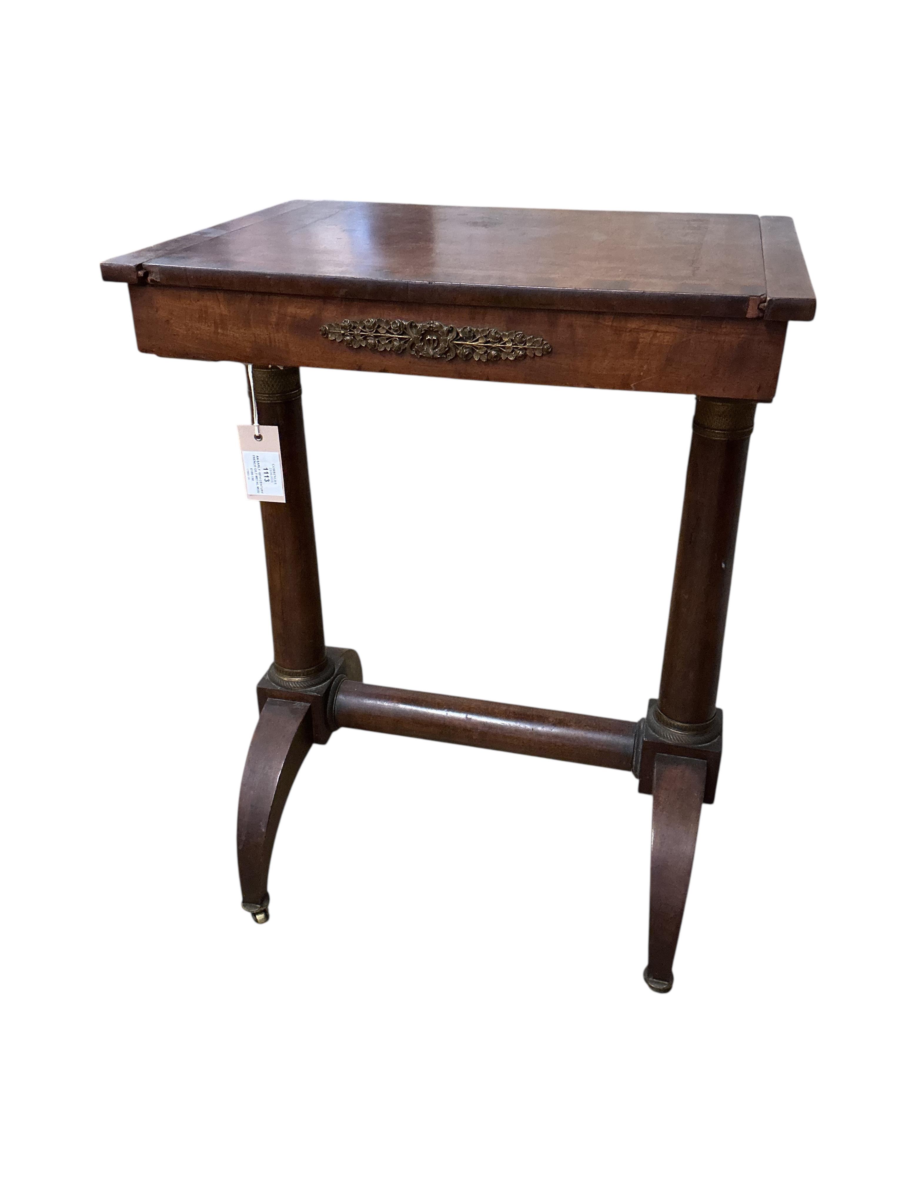 An early 19th century French gilt metal mounted mahogany games table, width 54cm, depth 41cm, height 70cm. Condition - fair